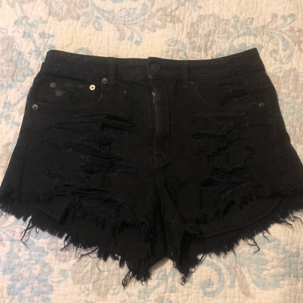 black ripped jean shorts
